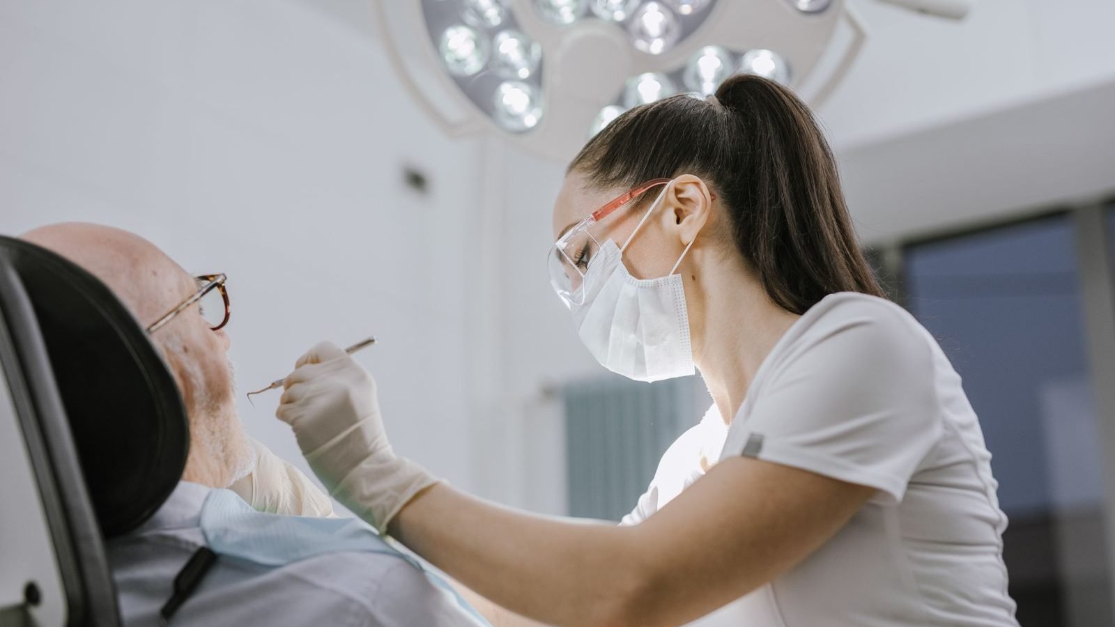 Dentist discussing dental implant treatment and cost with a patient at The Dental Ethics, Pune