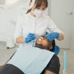 Dentist performing a gentle, comfortable root canal examination on a patient at The Dental Ethics, Pune